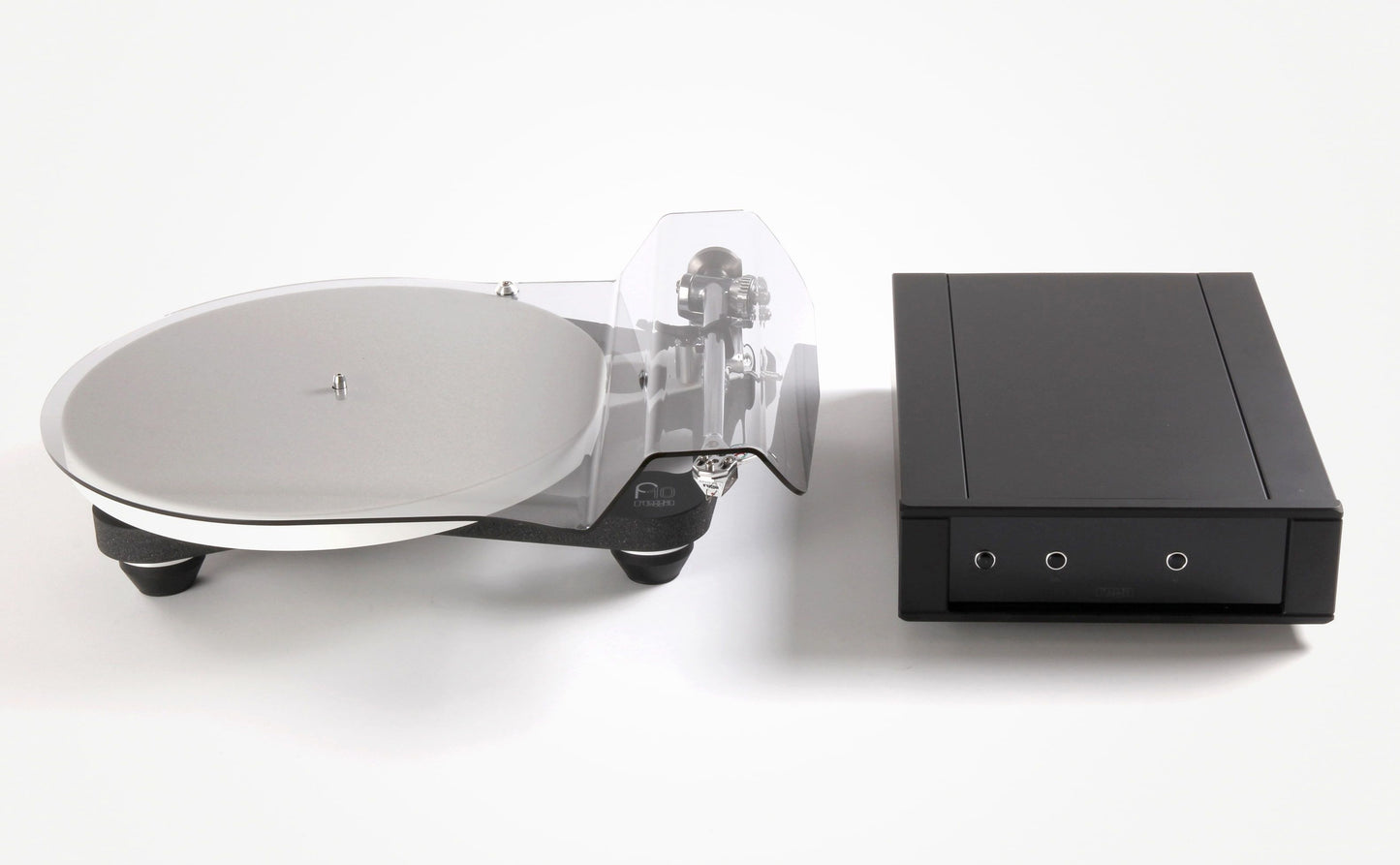 Turntable with a clear platter and black tonearm on a white background