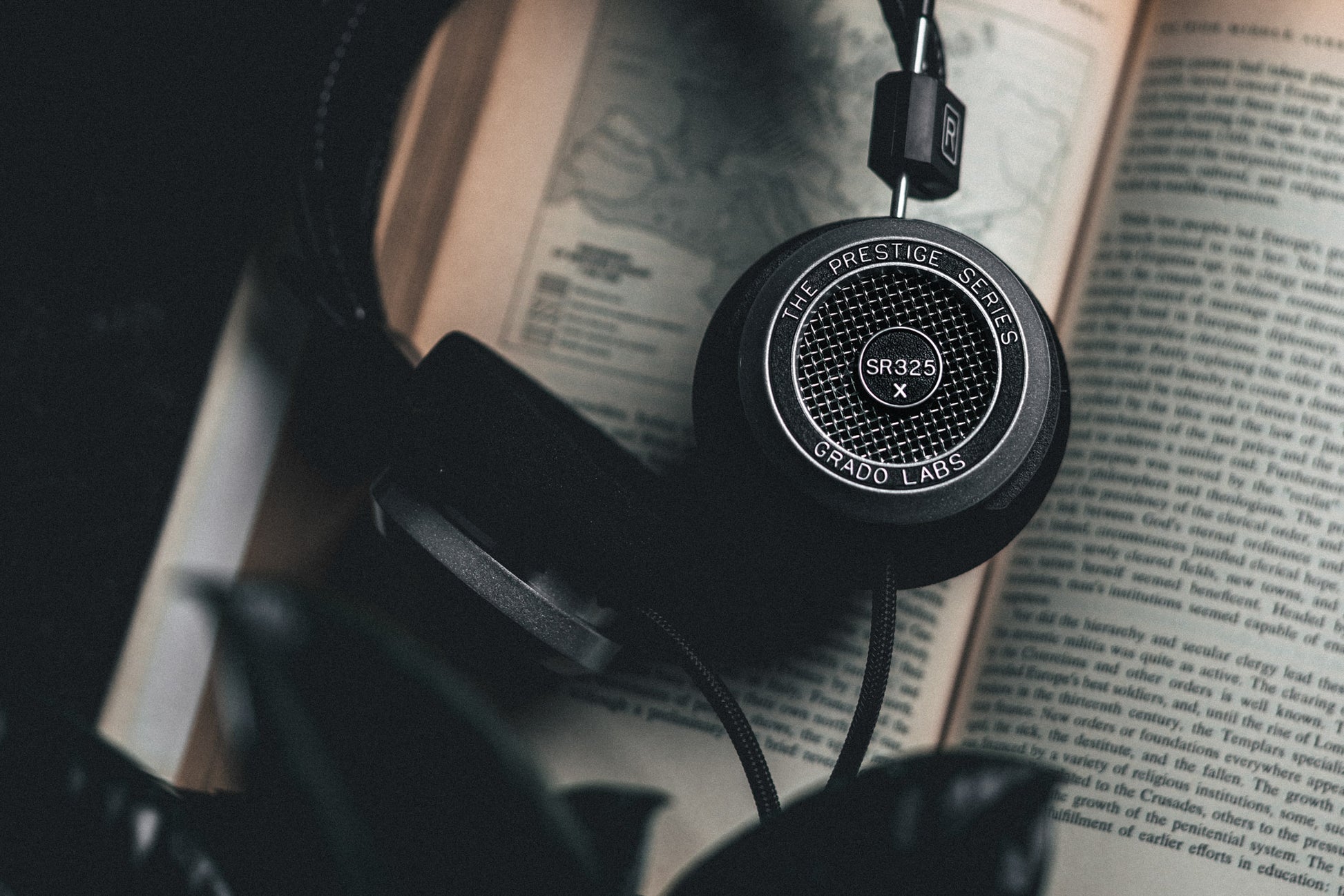 Grado Labs SR325x Headphones on Book